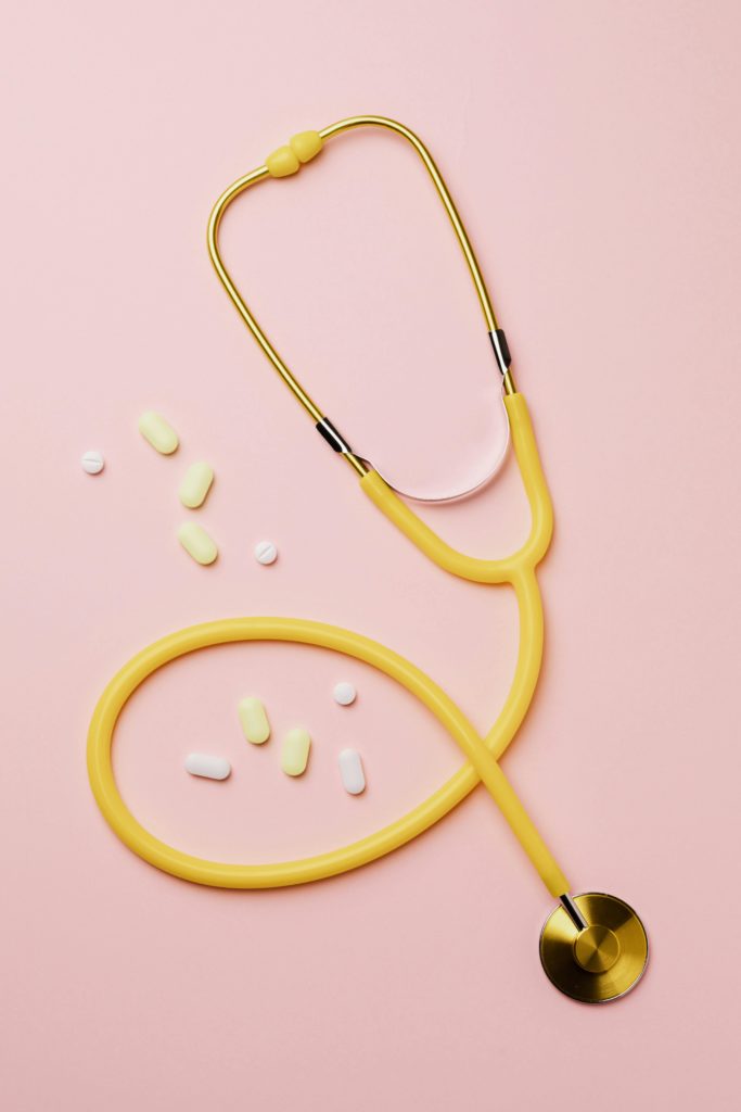 antibiotics pills and stethoscope on medical desk modern interior aesthetic.jpg