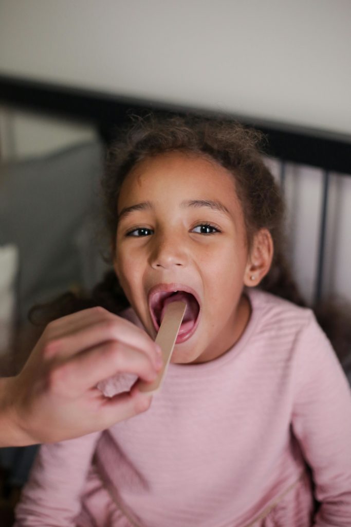 child sore throat examination aesthetic professional photography.jpg